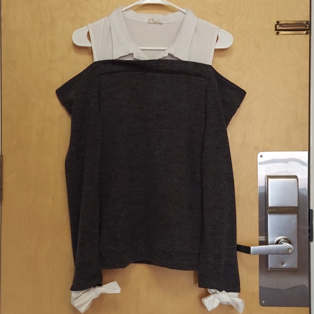 Sweater is by Hem & Thread in a size Large and is a dark grey color.